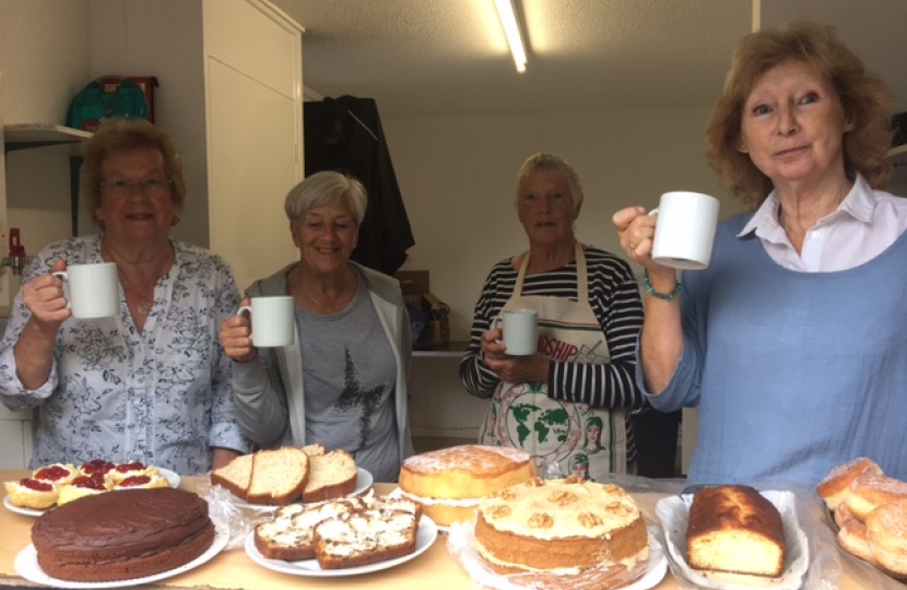 The ladies from the Totnes Constituency CWO serving tea and cake in Dartmouth's Royal Avenue Gardens